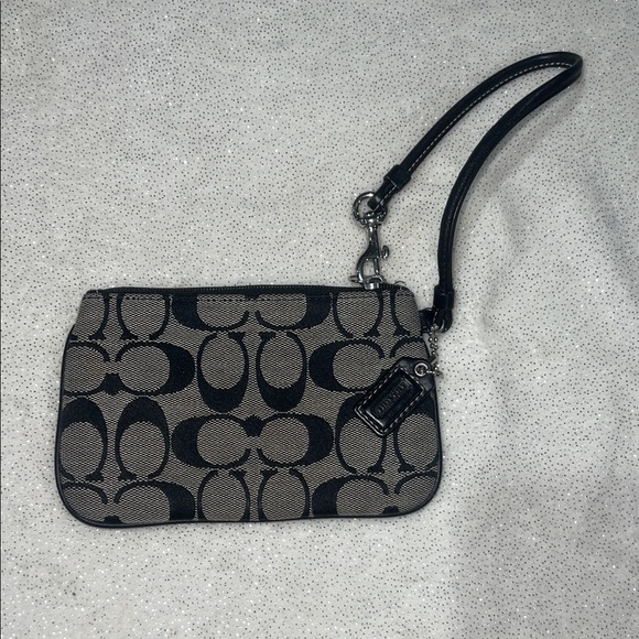 Coach Handbags - Coach Black and Cream Patterned Wristlet